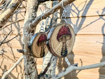 Funguy earrings made from reclaimed wood tree cookie